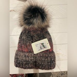 Hat with faux fur pompom